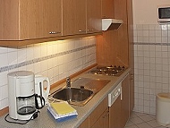 Wohnraum mit integrieter Küchenzeile